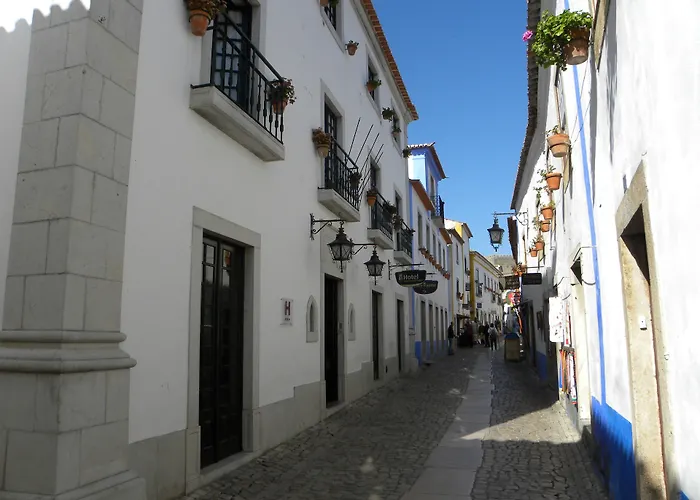 Rainha Santa Isabel - Óbidos History